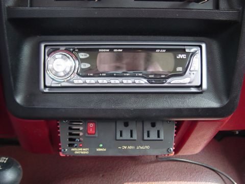 1988 Ford Bronco - All done and mounted. I'll be getting a stronger one soon, but this works great for charging a cell phone or running small devices.