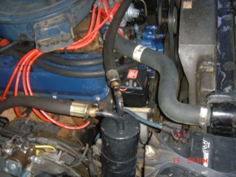 1975 Ford Ranchero - Promaster coil mounted on the front right end of the engine.