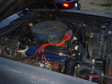 1975 Ford Ranchero - Engine bay details, including air cleaner and spark plug wires.
