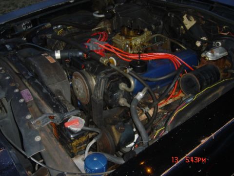 1975 Ford Ranchero - Close-up view of a vehicle's engine bay, showing various components and wiring.