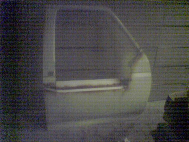 cruddy picture but shows first door cut out. folding the outer skin  over to provide the door with stability...and one less length to weld.
more pictures to come as the project continues.