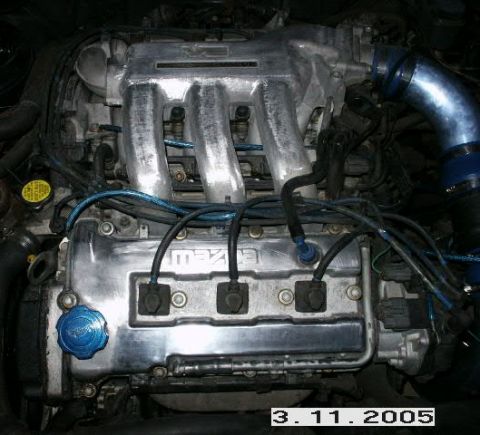 1993 Mazda MX-6 - My front valve cover and intake manifold part way polished.
