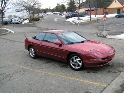 1993 Ford Probe - Passenger front (shows rio red hood)