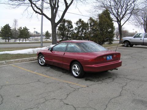 1993 Ford Probe - Driver rear, shows the aluminum wing bolts better