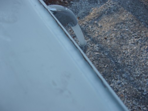 My rain gutters also were beginning to crack because they were filled with bondo. Notice the crack along the top edge of the gutter.