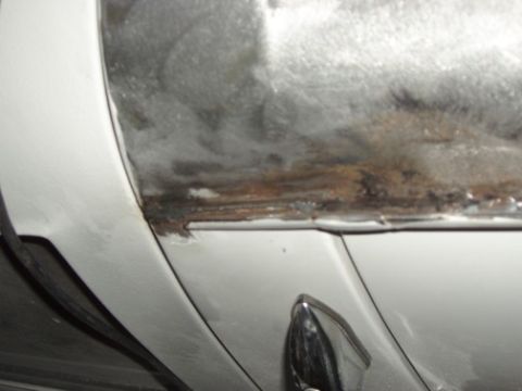 1995 Ford C-350 (Centurion Conversions) - Bead of cold weld to cover crack between roof and gutter.