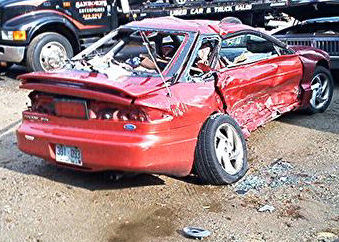1993 Ford Probe - 2nd gen Probe ran stop sign, got T-boned by mid sized truck, then spun around and hit a car on his left side, being air-borne the whole tim…