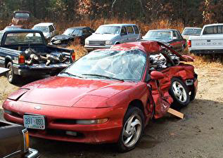1993 Ford Probe - 2nd gen Probe ran stop sign, got T-boned by mid sized truck, then spun around and hit a car on his left side, being air-borne the whole tim…