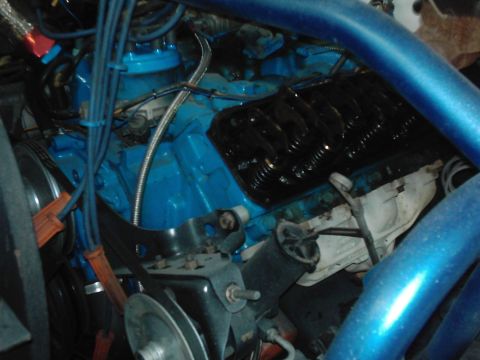 1978 Ford Bronco - Engine bay details with blue block and black valve covers visible.