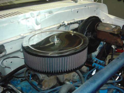 1978 Ford Bronco - Engine bay view of a 1978 Ford Bronco, an aftermarket air cleaner assembly.