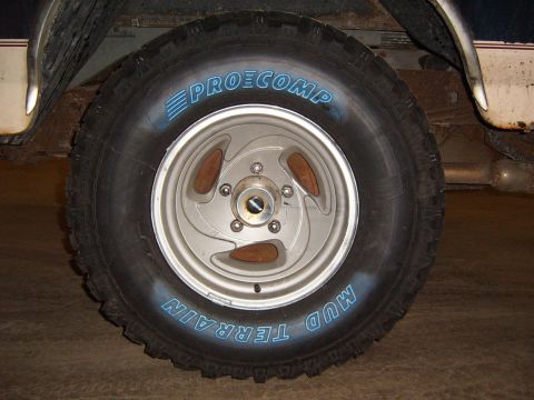 1993 Ford Bronco - Close-up of a Pro Comp Mud Terrain tire and aftermarket wheel.