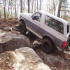 1995 Ford Bronco - This 1995 Ford Bronco navigates a challenging rocky terrain, its off-road capabilities.