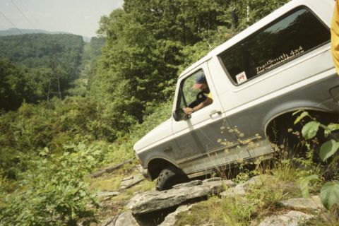 1995 Ford Bronco - This 1995 Ford Bronco is tackling a challenging off-road course.