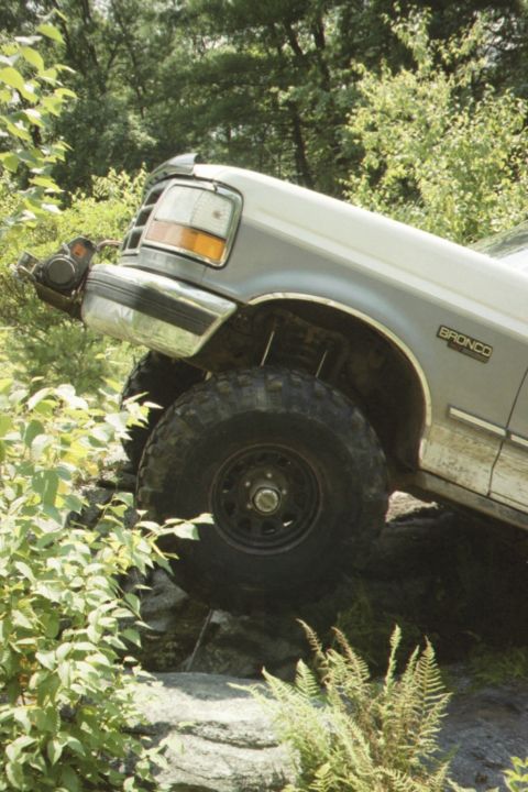 1995 Ford Bronco - This 1995 Ford Bronco navigates a rocky trail, its off-road capabilities.
