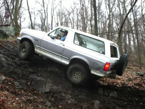 1995 Ford Bronco - This 1995 Ford Bronco navigates a challenging off-road trail.