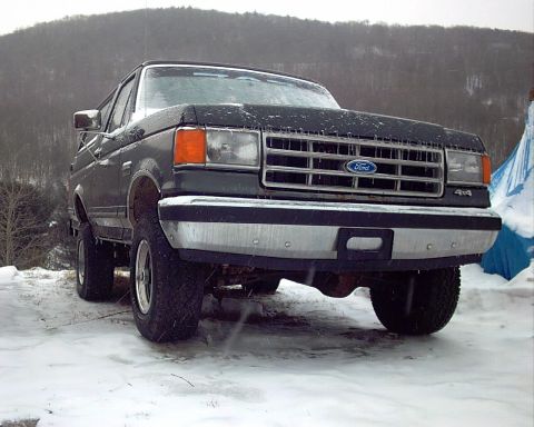1988 Ford Bronco - This 1988 Ford Bronco is shown in a snowy outdoor setting, highlighting its 4x4 capability.