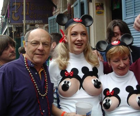 1968 Ford Mustang - People dressed in Mickey Mouse costumes on Bourbon Street, New Orleans.
