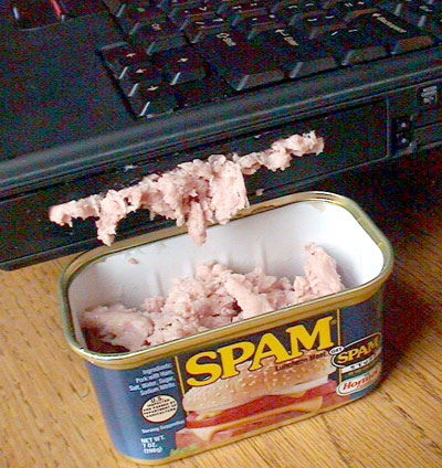1968 Ford Mustang - SPAM luncheon meat has spilled from its can onto a laptop keyboard.