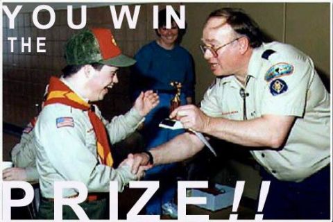1968 Ford Mustang - A scout is congratulated with a trophy, while text overlays the image with "YOU WIN THE PRIZE!"