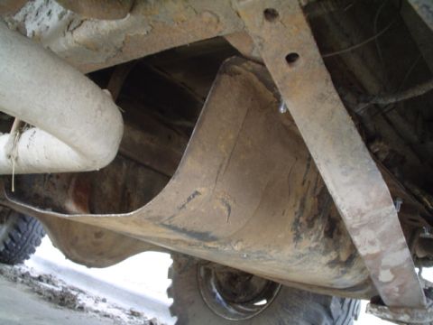 1981 Ford Bronco - hung the skid plate to make sure all the holes were clear and would line up. I had to move the air shock filler nozzle.