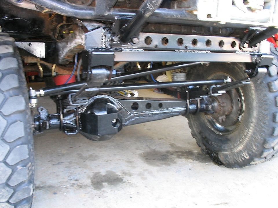 Rear axle and suspension of a modified truck with large tires