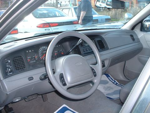 1999 Ford Crown Victoria - Interior view of a 1998 Ford Crown Victoria, showing the dashboard and steering wheel.