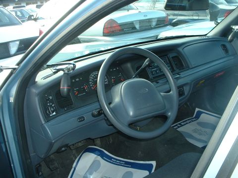 1999 Ford Crown Victoria - Interior of a 1998 Ford Crown Victoria, with other vehicles visible in the background.