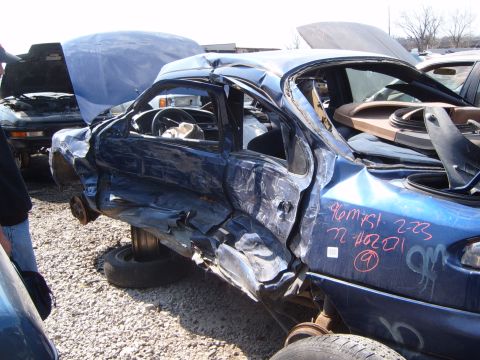 1993 Ford Probe - 1996 Mercury Mystike-Looks like this person got T-boned really hard. Judging from the way the seat was twisted into the door, I dont think…