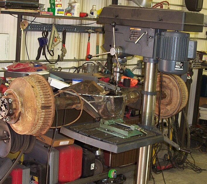 Dragged the drill press over to drill the plate for another cover bolt