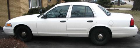 2001 Ford Crown Victoria - The car from the driver's side. Yes the tires came with it. :)
