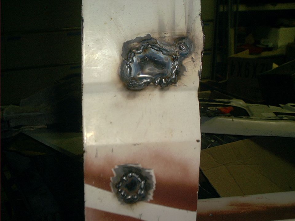 crappy plug welded holes from lock and handle.  these will get bondo to finish them off.