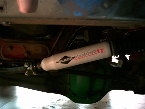 1988 Ford Bronco - A Black Diamond AT steering stabilizer is visible, mounted to the underside of a vehicle.