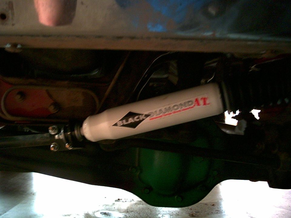White Black Diamond AT steering stabilizer with black diamond logo