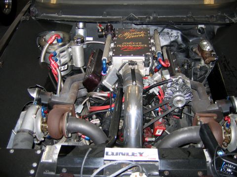 2000 Ford Crown Victoria - Custom twin-turbocharged V8 engine with a "Midnight Touch" intake manifold and "Conley's Performance" branding.