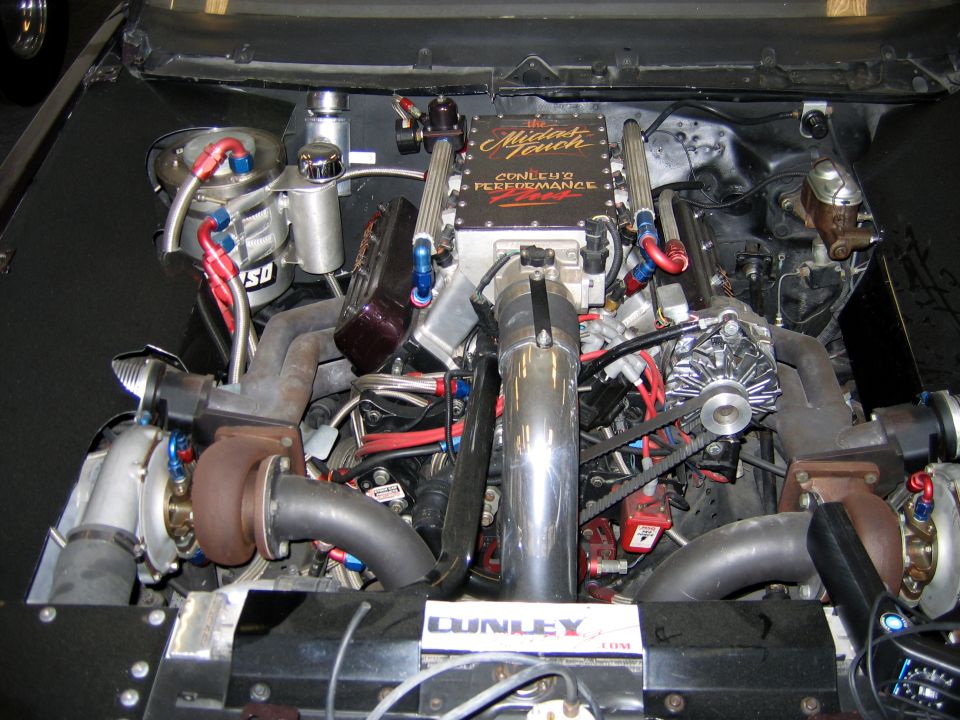 Twin-turbocharged V8 engine with "Midnight Touch" intake manifold