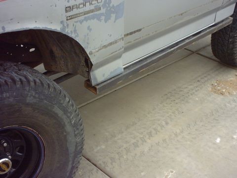1990 Ford Bronco - This vehicle features a "Bronco" badge and appears to have custom metal running boards installed.
