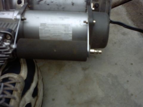 1990 Ford Bronco - This image shows a close-up of an air compressor, not a 1990 Ford Bronco.