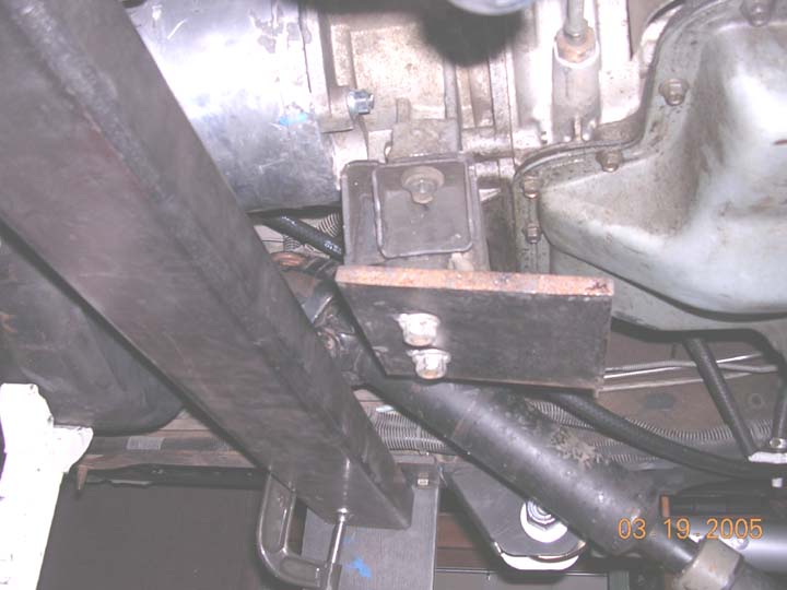 how the tranny will mount.  Will use a piece of round tube bent in a horshoe.  The tranny bolts are 4 inches away from the square tube