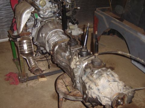 1992 Ford Bronco - Engine and transmission assembly, likely removed from a vehicle for repair or modification.