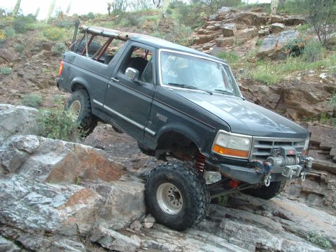 1993 Ford Bronco - Trying to break the Fabritech, coming down the waterfall. Notice the toco on my rear quarter pannel. I did that going up the waterfall. Als…