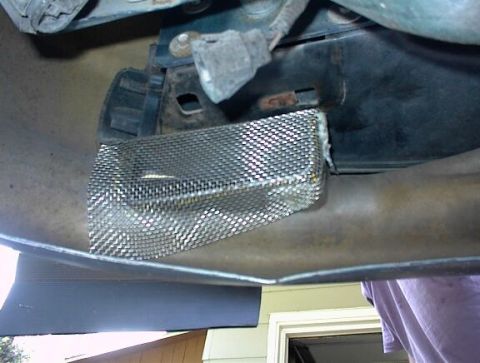 1993 Ford Taurus - Bug screen formed to the back. I glued it in place with silicone.