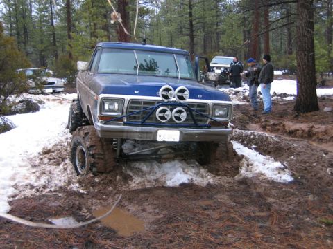 1985 Ford Bronco - Off-road excursion in muddy and snowy conditions with a modified Ford pickup truck.