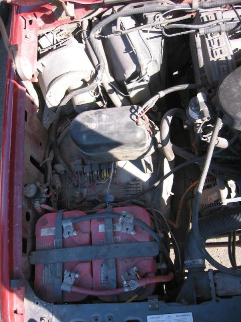 1985 Ford Bronco - Left side of the engine compartment. Mike Located the Vacuum box over there.