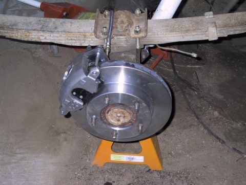 1983 Ford Bronco - passengers side complete, used 78 f150 front rotors, had to put little spaces over the studs to keep the rotor centered properly. Using 86…