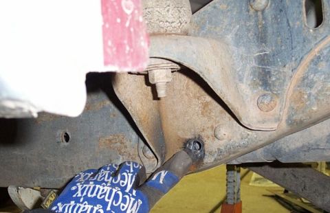 1986 Ford Ranger - Now, for the front hangers for the rear springs, I determined where I wanted them and found one of the stock holes would work well with thi…