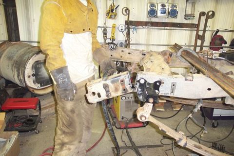 1986 Ford Ranger - Great shot of me, huh? I cut 10" off the rear frame. Note the factory rear xmember has been moved forward (it's cheesy but I don't have tim…