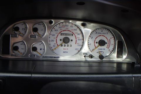1989 Ford Probe - Close-up of a car's instrument cluster, showing various gauges and the odometer reading.