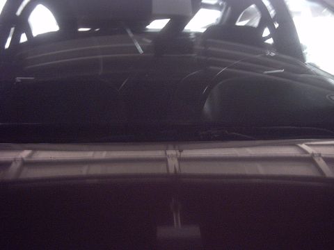1989 Ford Probe - Interior view of a dark-colored car, focusing on the dashboard and windshield area.