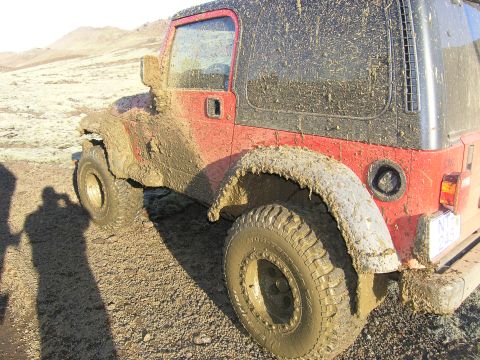 2001 Jeep Wrangler - This 2001 Jeep TJ is heavily covered in mud after off-roading.
