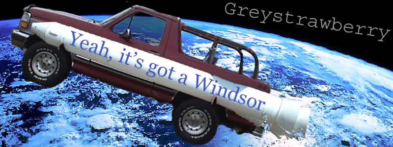 Maroon 1994 Ford Bronco with 'Yeah, it's got a Windsor' text on a missile, in space